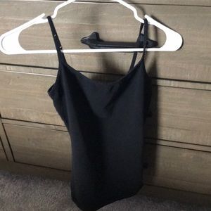 A basic all black tank top